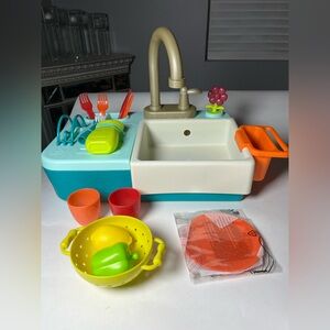 NWT b toys splash-n-scrub sink.  Working Faucet. Includes 18 pieces.  New in box